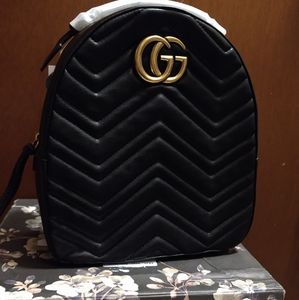 Gucci marmot quilted backpack